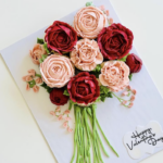 The blush pink and crimson cupcake rose bouquet